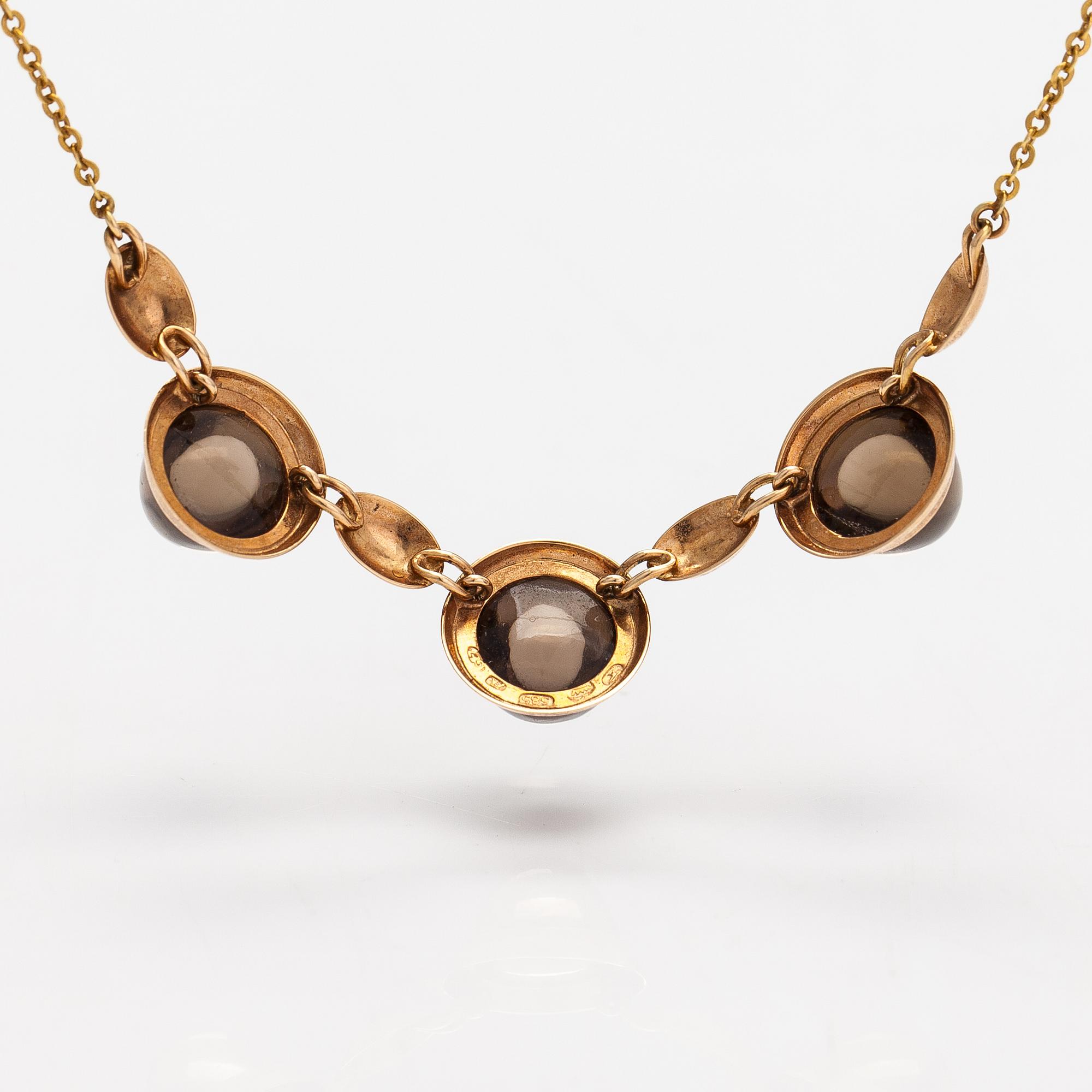 Elis Kauppi, A 14K gold necklace with smoky quartzes. Kupittaan kulta, Turku 1960.
