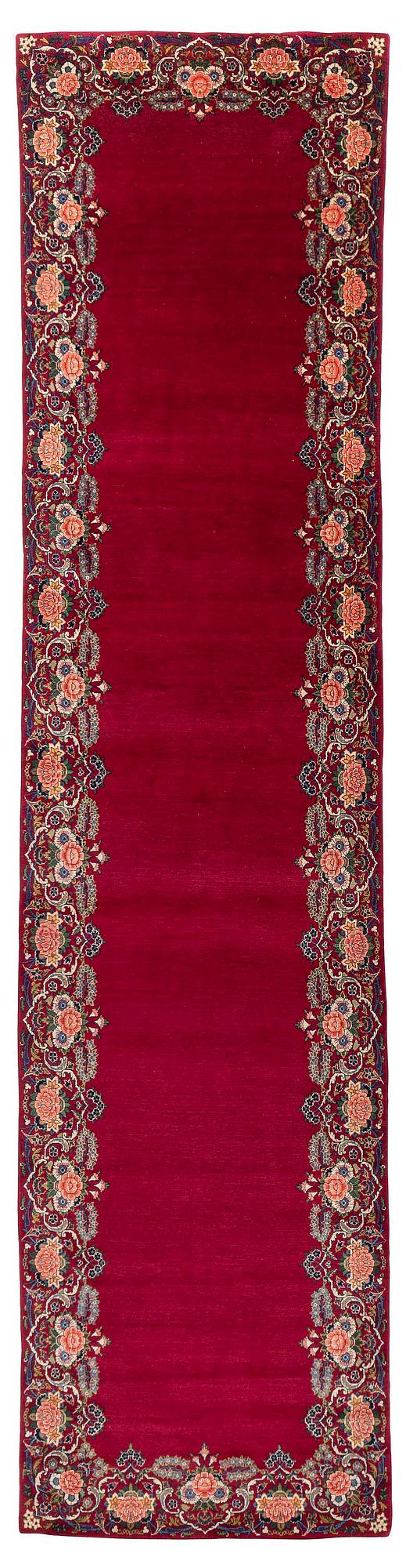 A semi-antique Keshan runner, c. 446 x 112 cm.