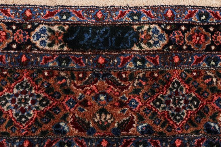 A carpet, Moud, signed, ca 385 x 268 cm.