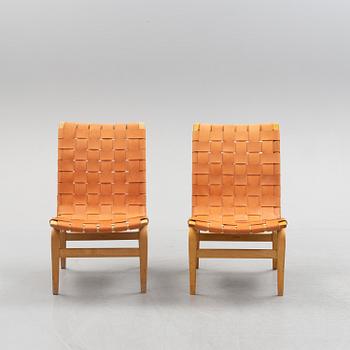 A pair of Bruno Mathsson 'Eva' lounge chairs, by Karl Mathsson, for VÄrnamo, 1965 and 1970.