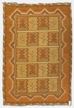 Aino Keinänen-Baeckmann, A 1920s Finnish flat weave carpet. Circa 300 x 203 cm.