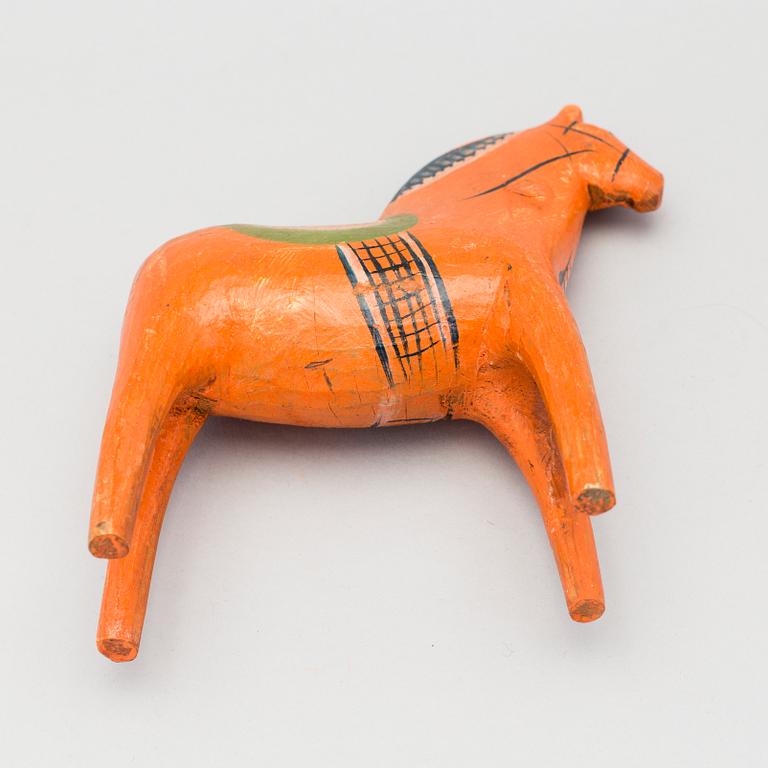 A painted folk art dala horse first half of the 20th century.