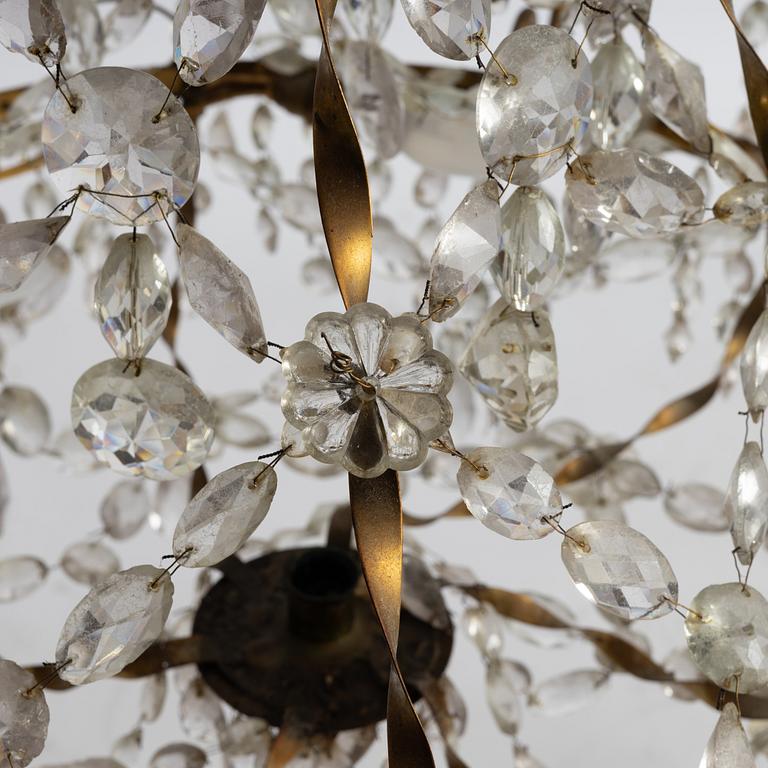A late Gustavian gilt brass and cut glass seven-light chandelier, Stockholm, late 18th century.