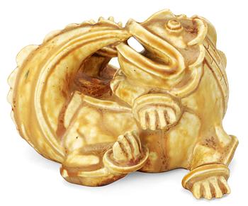 678. A Wihelm Kåge stoneware dragon's puppy by Gustavsberg, 1940's.