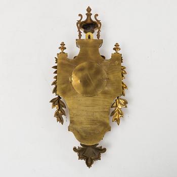 A first half of the 20th century brass wall clock.