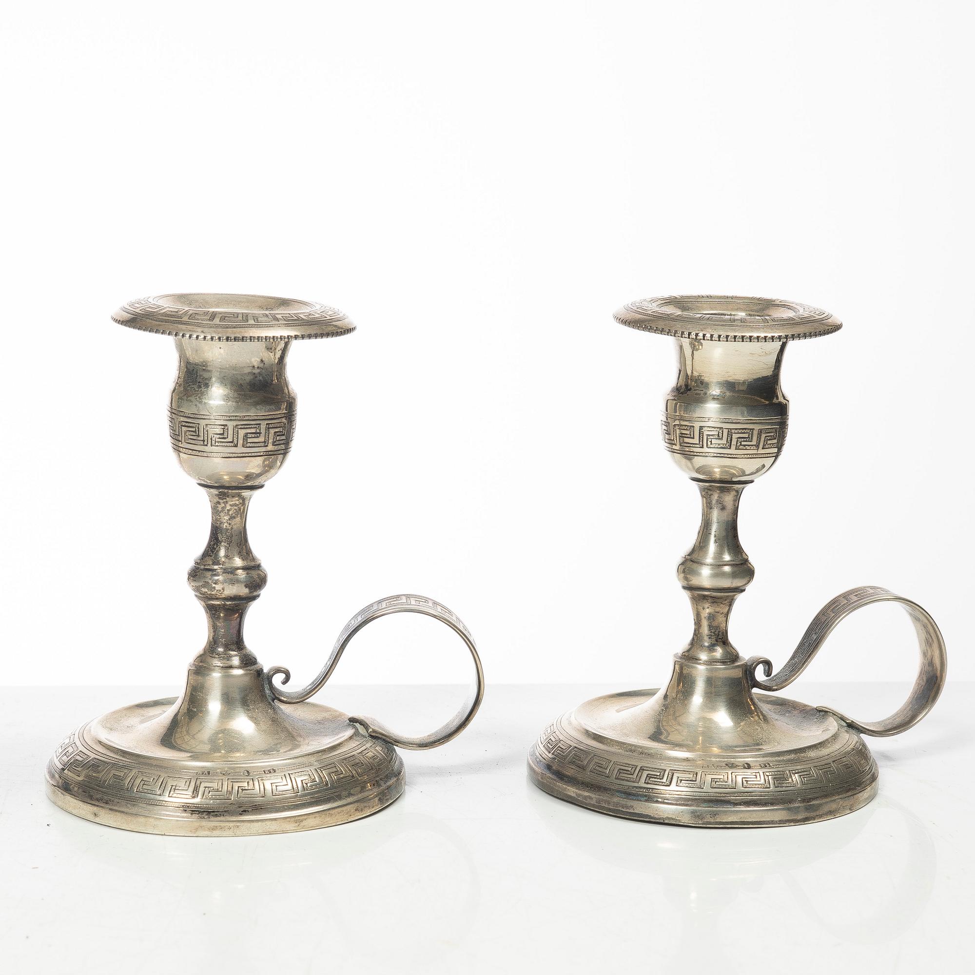 Four pairs och Swedish silver candlesticks, 19th-20th century.