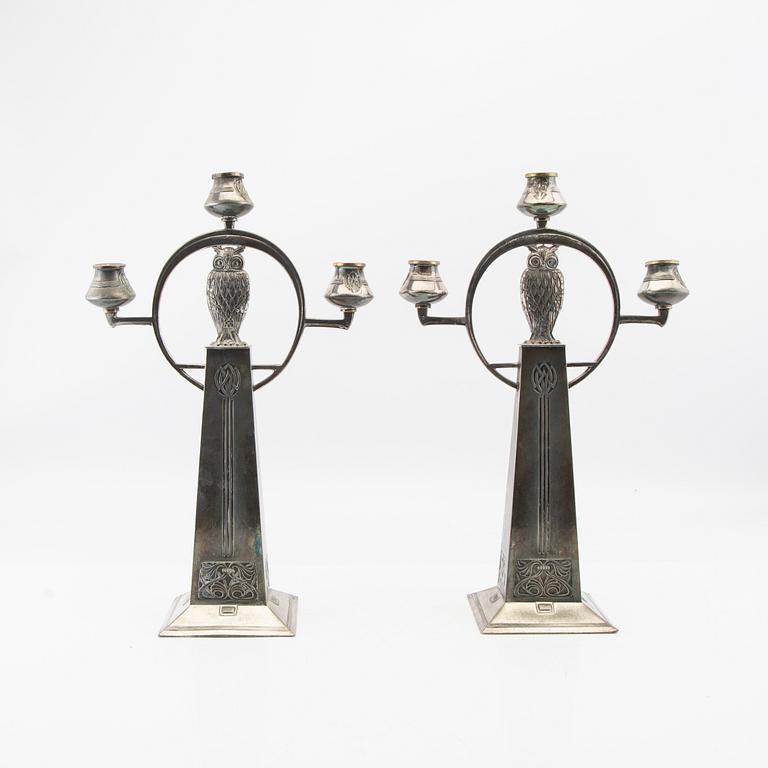 Candelabras, a pair by WMF (Württembergische Metallwarenfabrik), early 20th century, nickel silver.