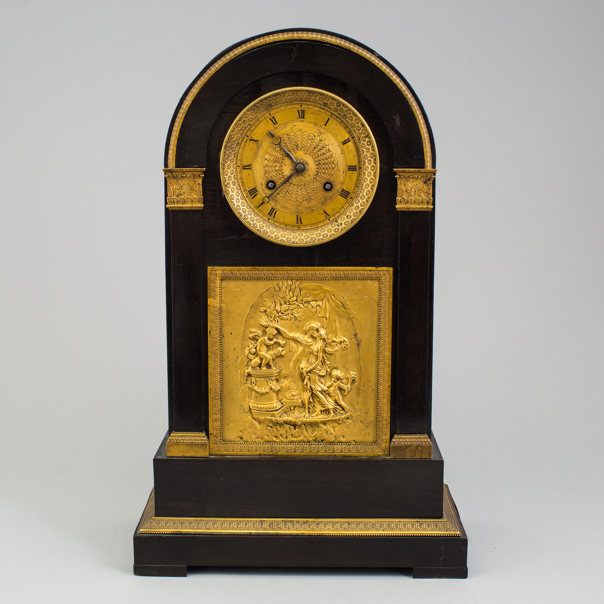 An enpire mantle clock, first half oc the 19th Century.