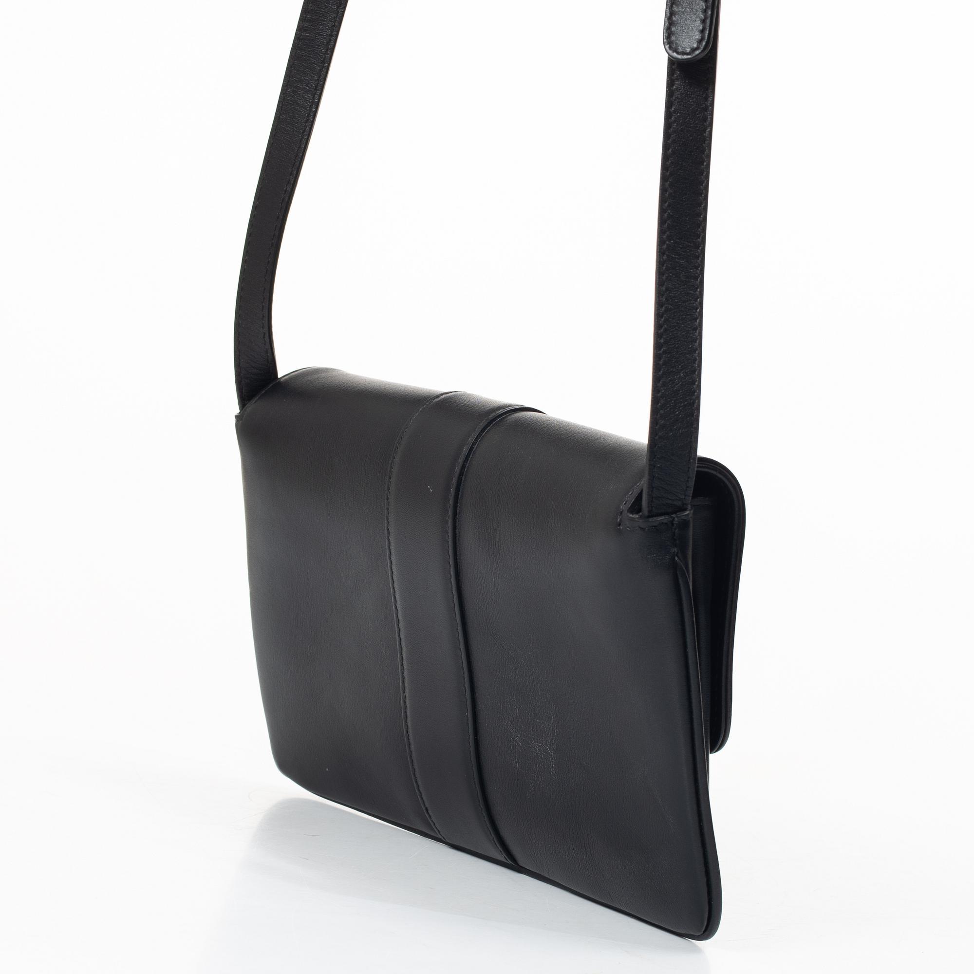 Gucci, a handbag.