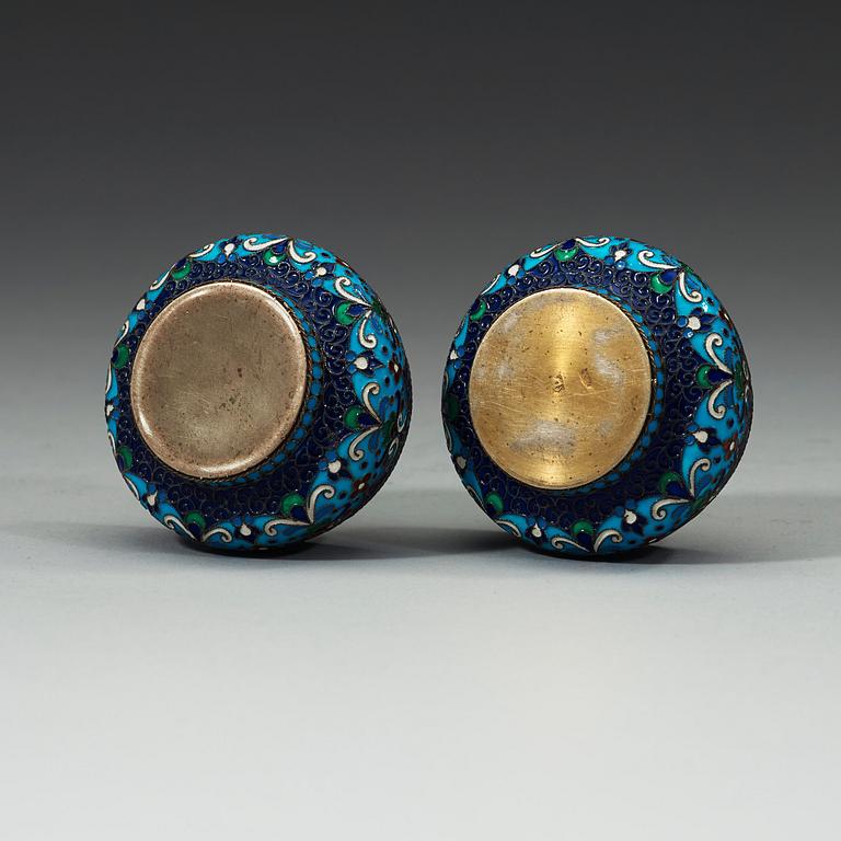 A pair of Russian early 20th century silver-gilt and enamel salts, unidentified makers mark, Moscow 1899-1908.