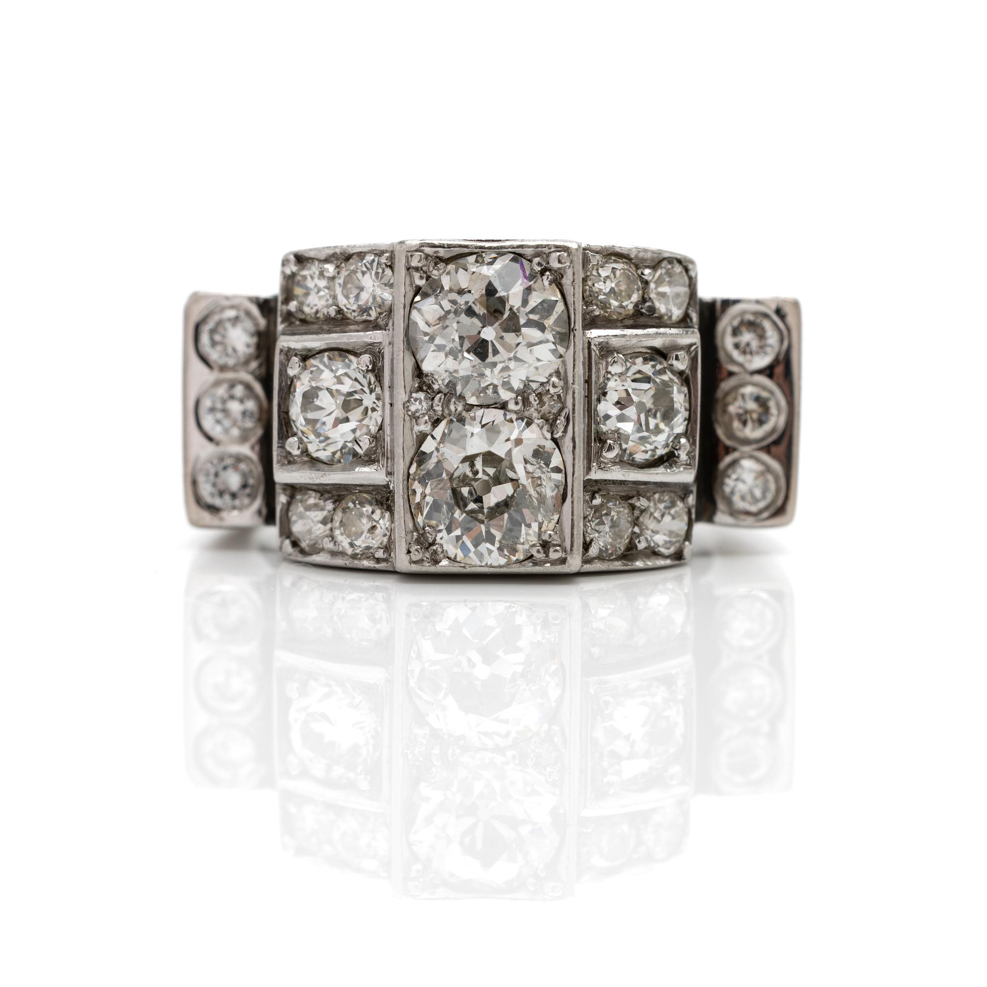 18K white gold ring with diamonds.