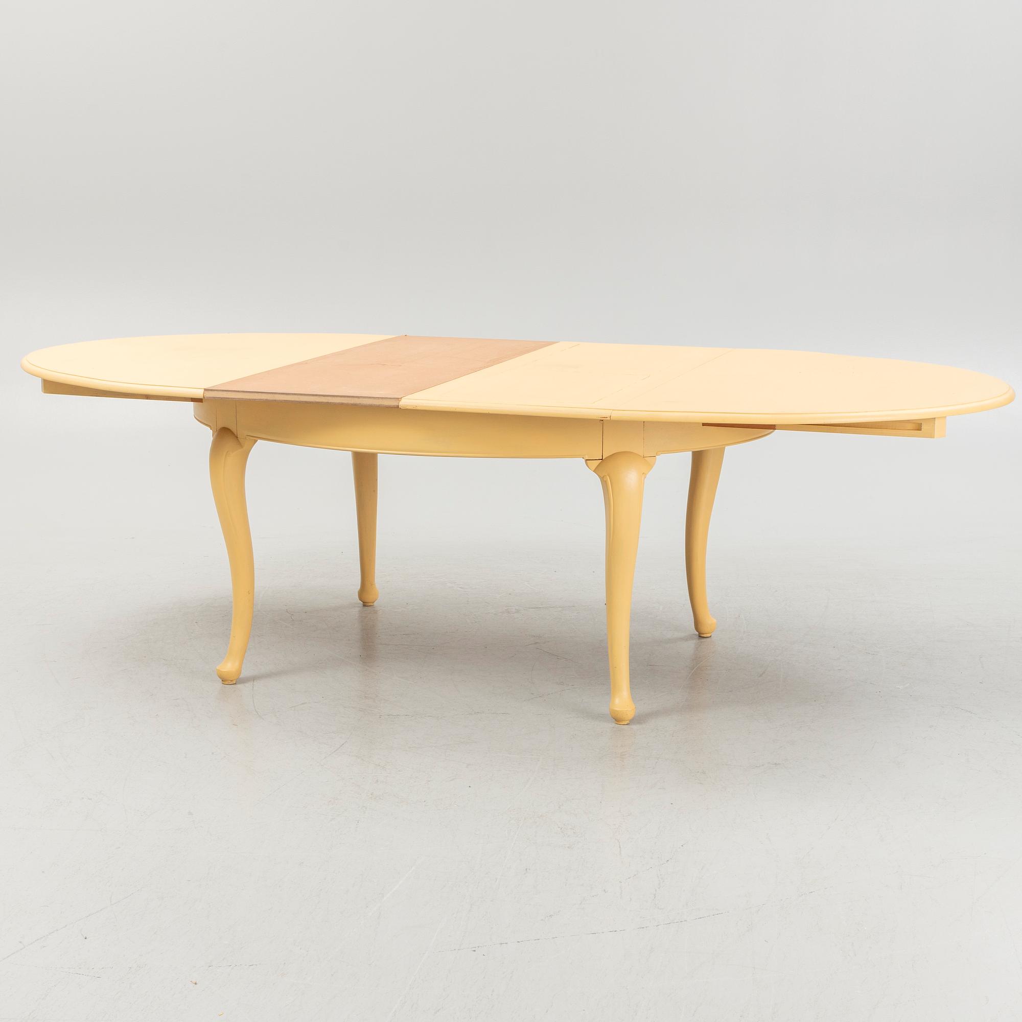 A 13-piece Rococo style dining room furniture suite, 20th Century.