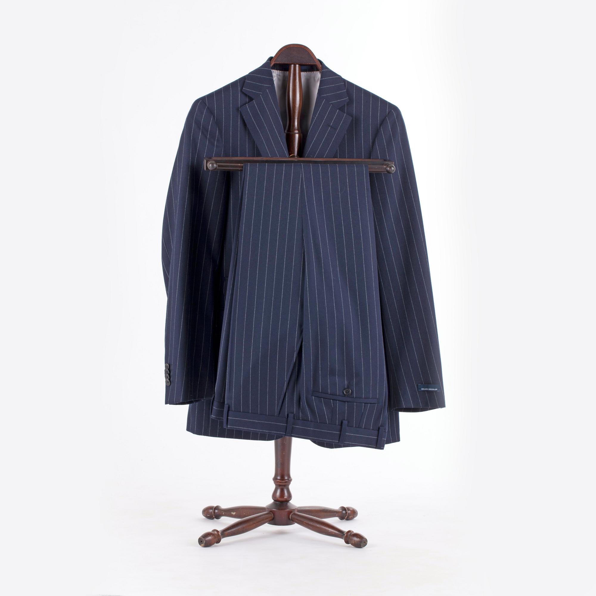 EDUARD DRESSLER, a blue wool suit consisting of jacket and pants. Size 48.