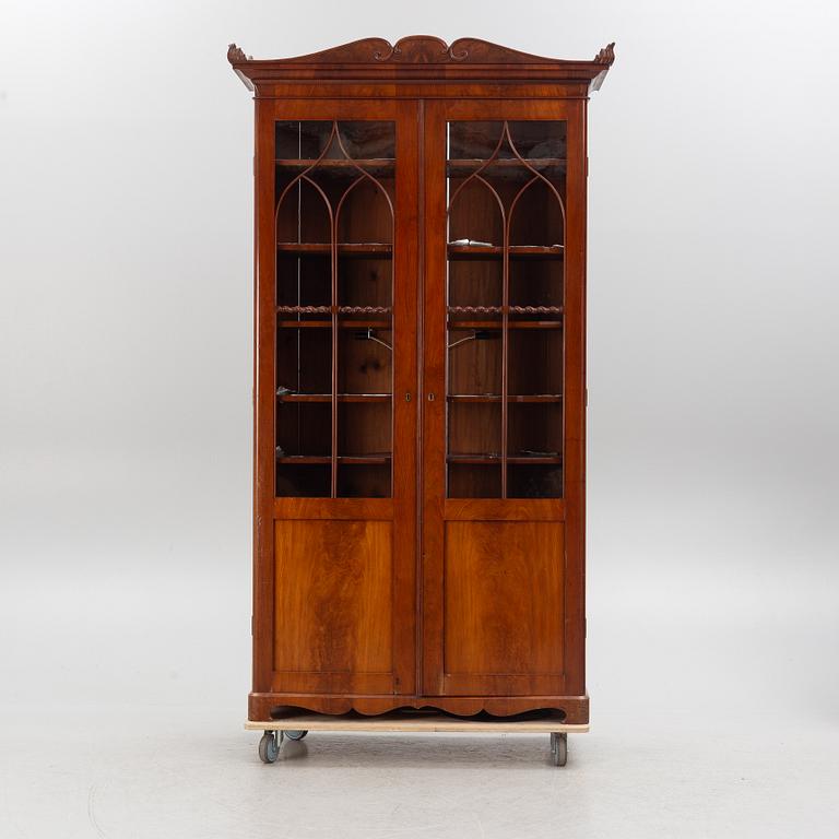 A late Empire mahogany book cabinet, Stockholm 1830's.