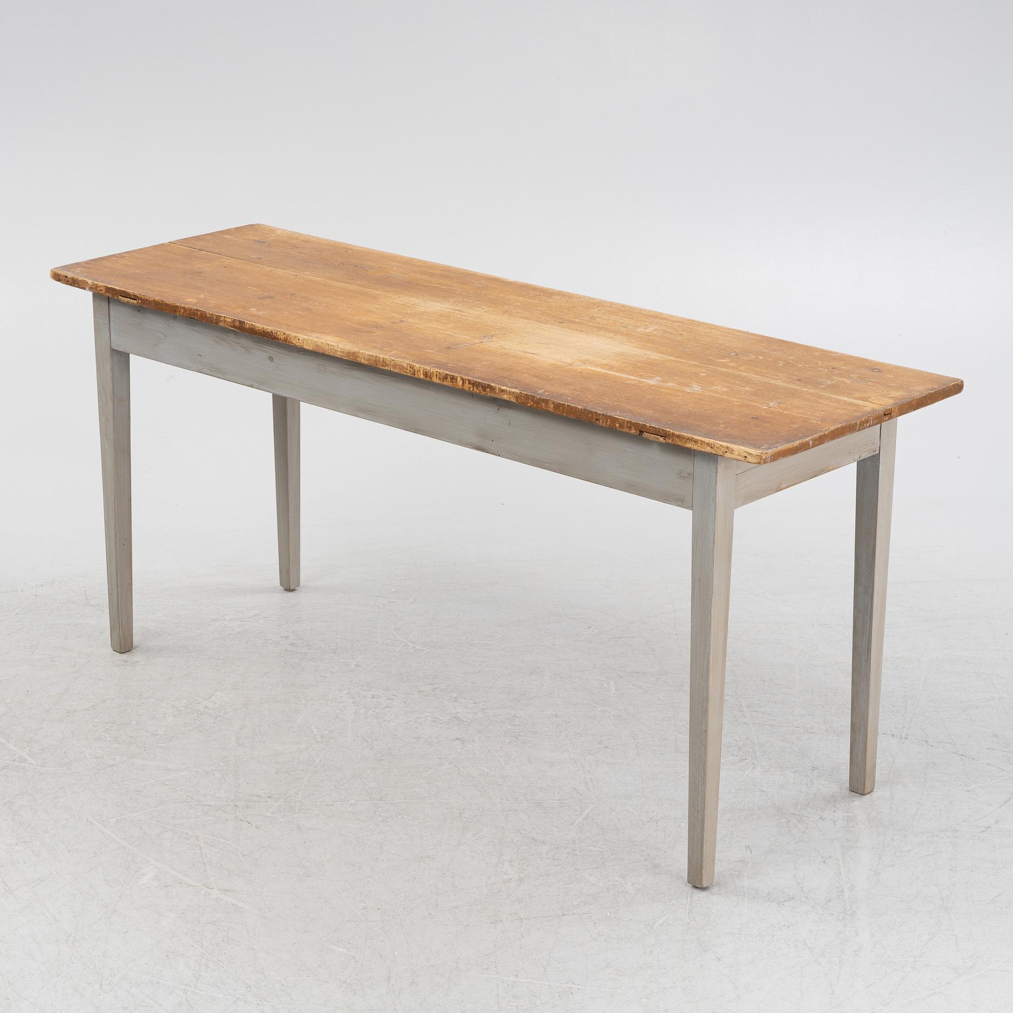A painted pine table, contemporary with older parts.