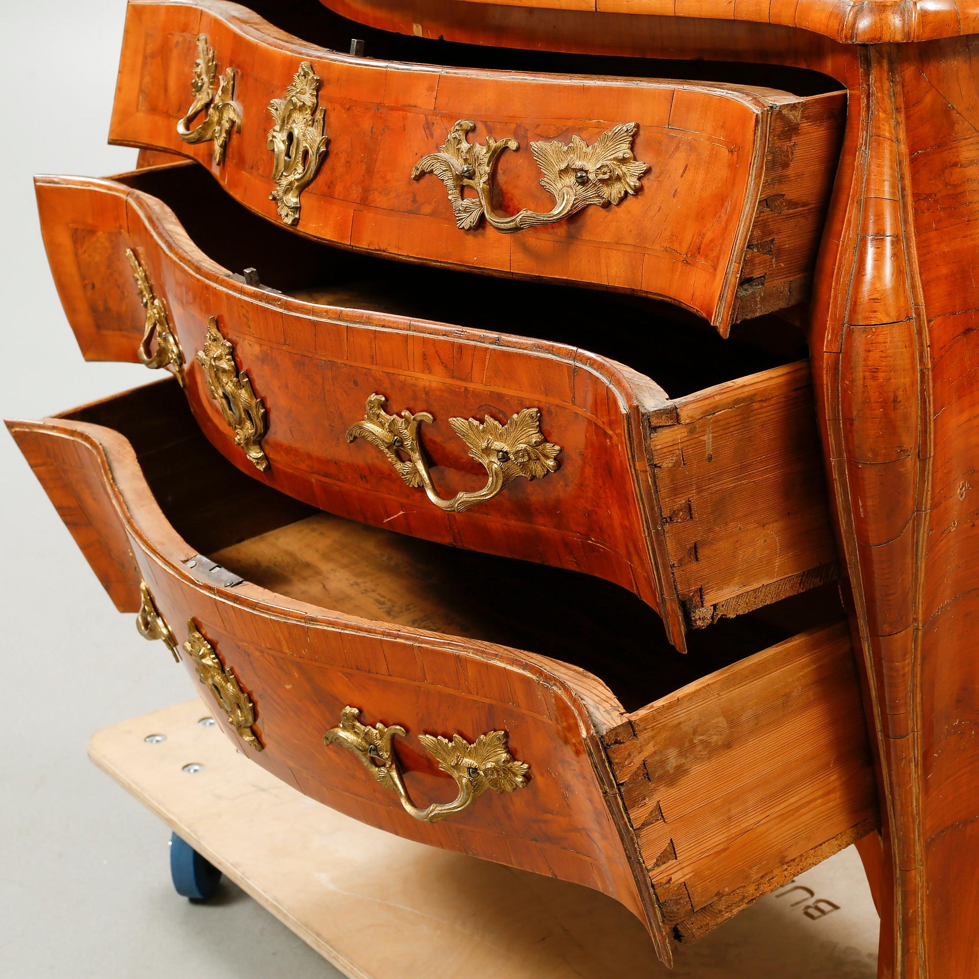 A Rococo bureau from the 18th century.