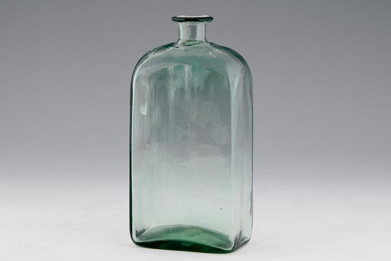 A GLASS BOTTLE.