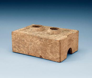 1613. A potted model of a stove, Han dynasty (206 BC - 220 AD).