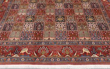 A Moud part silk carpet, 354 x 252 cm.
