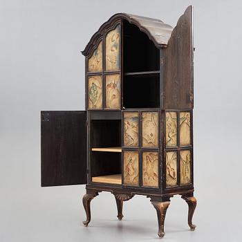 Tor Hörlin, a Swedish Grace decorated oak cabinet, dated 1920.