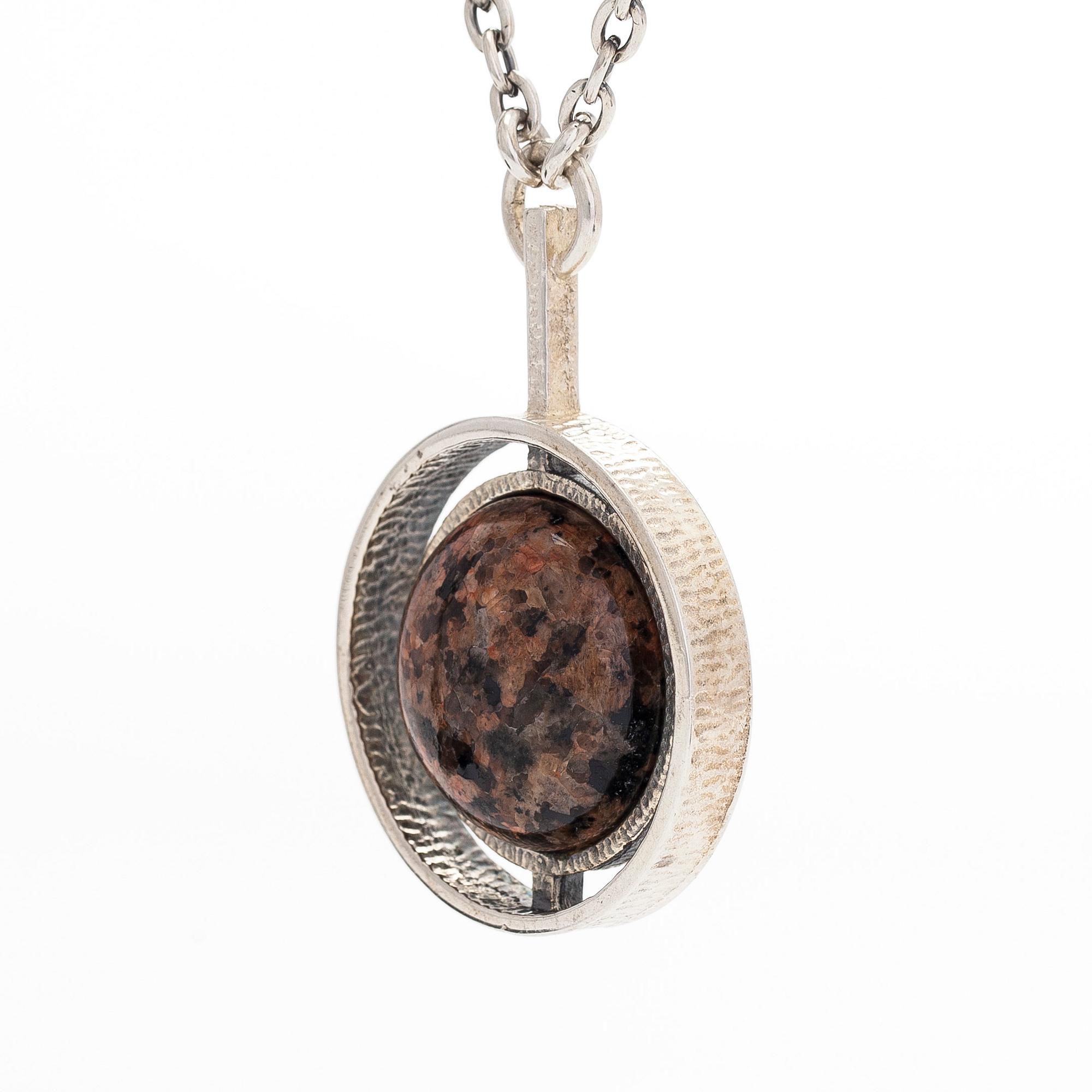 Helena Tynell, a silver and granite necklace with pendant, Turun Hopea, Turku 1975.