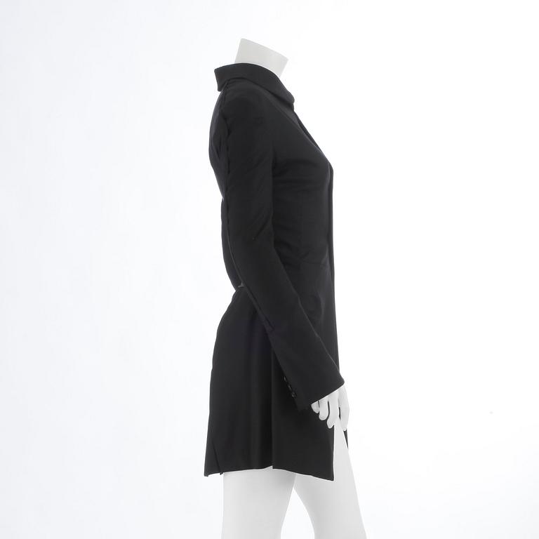 COMME DES GARÇONS, a black wool and lycra ladies suits jacket. Size m.