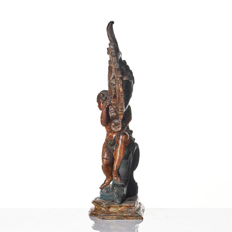 A Northern-European rococo carved pocket-watch holder, later part 18th century.