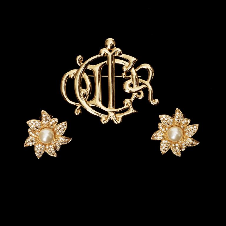 A brooch and a pair of earring by Christian Dior.