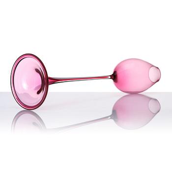 Nils Landberg, a cerise tinted glass goblet, Orrefors Sweden 1957.