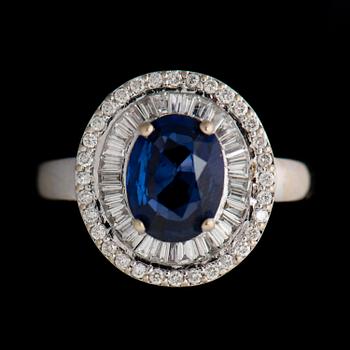 A RING, facetted sapphire, diamonds, 18K white gold.