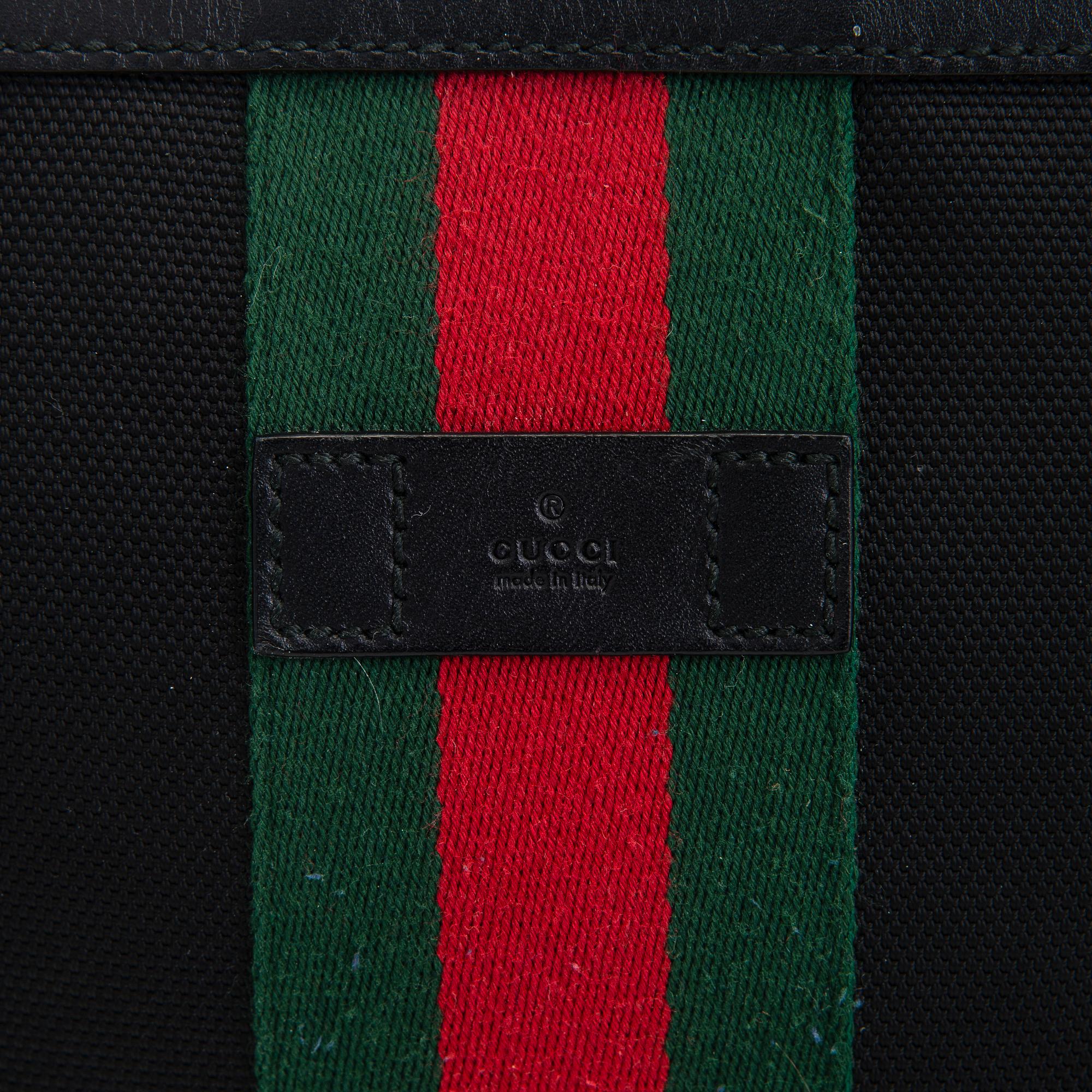 Gucci, a "Techno Canvas Web Messenger" bag.