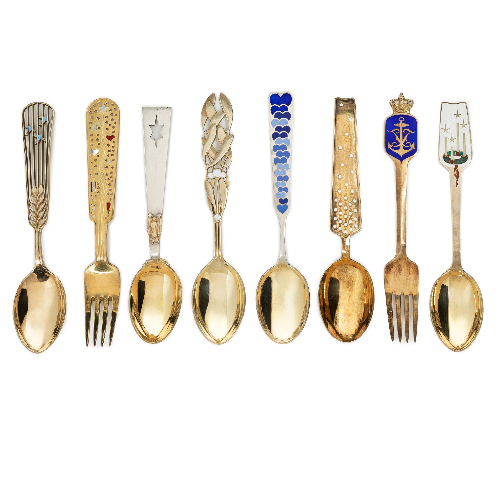 Anton Michelsen, Annual/Christmas cutlery, 8 pieces, gilt sterling silver and enamel, Denmark, 1930s–40s.