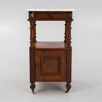 An early 20th century bedside table.