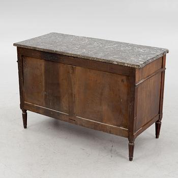 A Franch Directoire mahogany and marble commode, late 18th century.