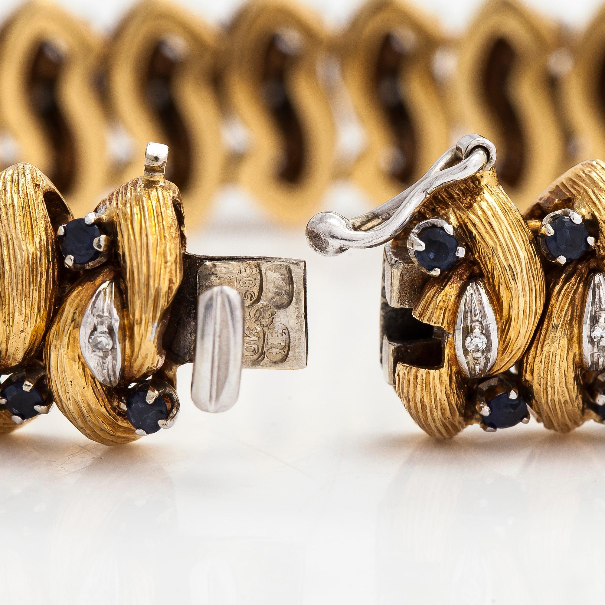 An 18K gold bracelet, diamonds approx. 0.14 ct in total and sapphires, Italy. Finnish import marks.