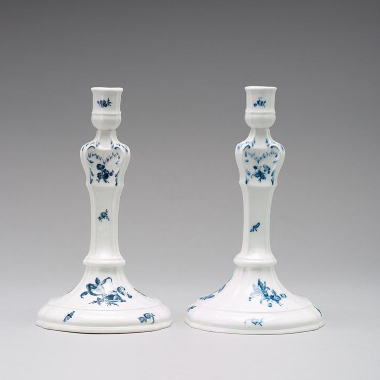 A pair of Berlin porcelain candle sticks, 18th Century.