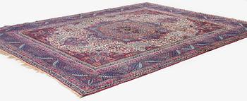 A semi-antique Kirman carpet, South Persia, c. 380 x 289 cm.