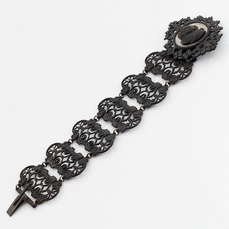 A Berlin iron and steel bracelet with a cameo.