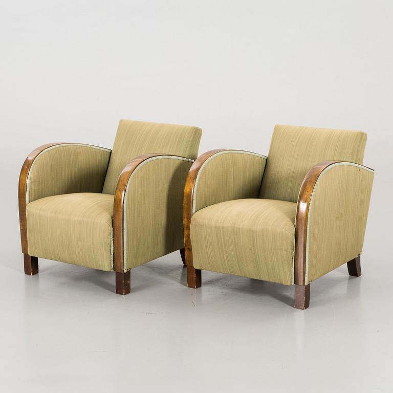 A PAIR OF 1940's ARMCHAIRS.