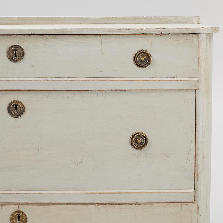 A chest of drawers, circa 1900.