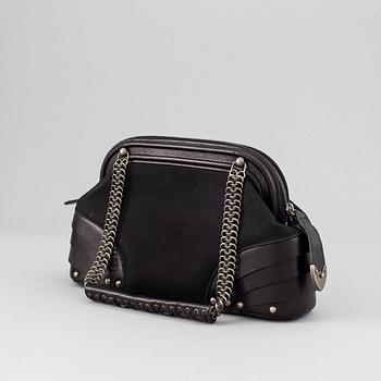Christian Dior, a leather bag.