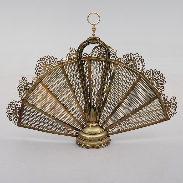 BRASSKYDD, mässing, 1900-talets första hälft.
