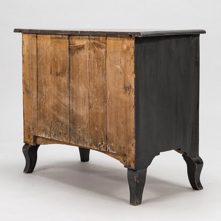 An 18th-Century chest of drawers.
