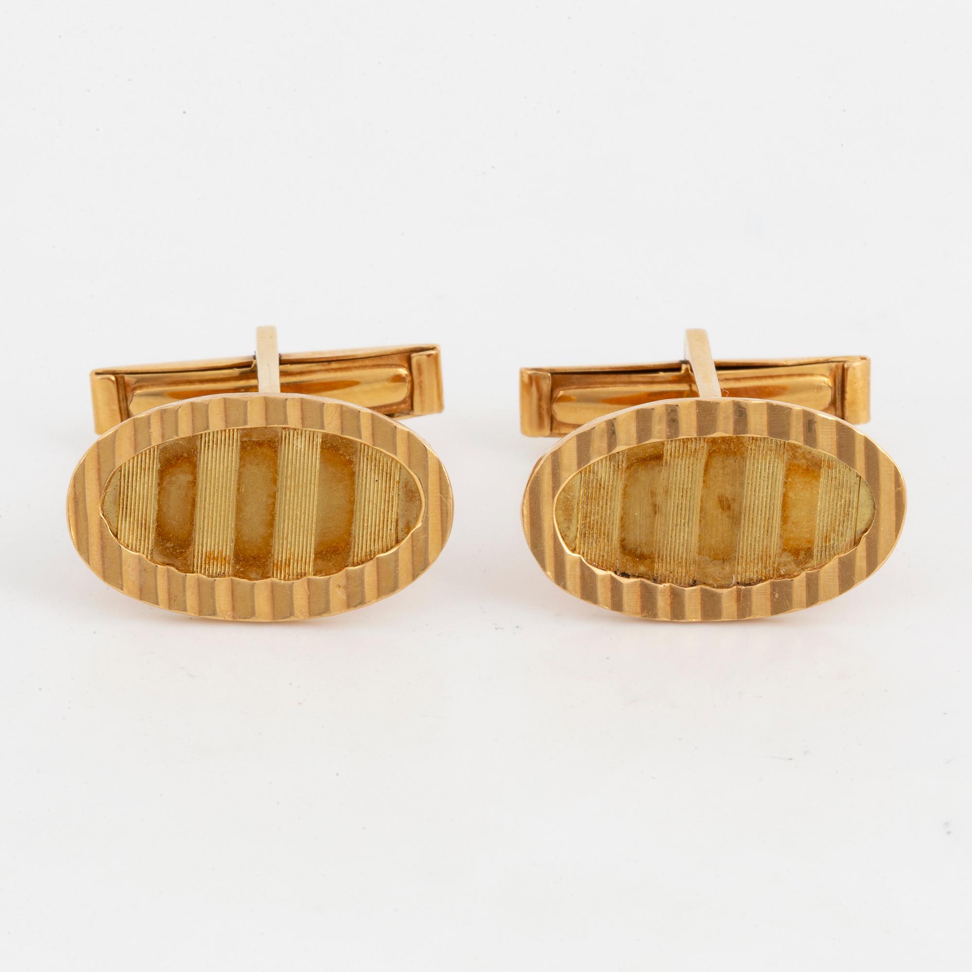 MANSCHETTKNAPPAR, 18K guld.