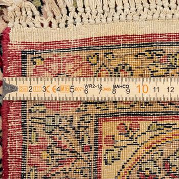 An antique pictoral Kerman rug, ca. 229 x 144 cm.