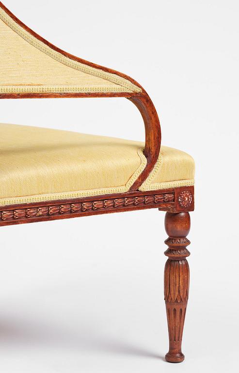 A pair of late gustavian armchairs in the manner of Ephraim Ståhl, Stockholm, circa 1800.