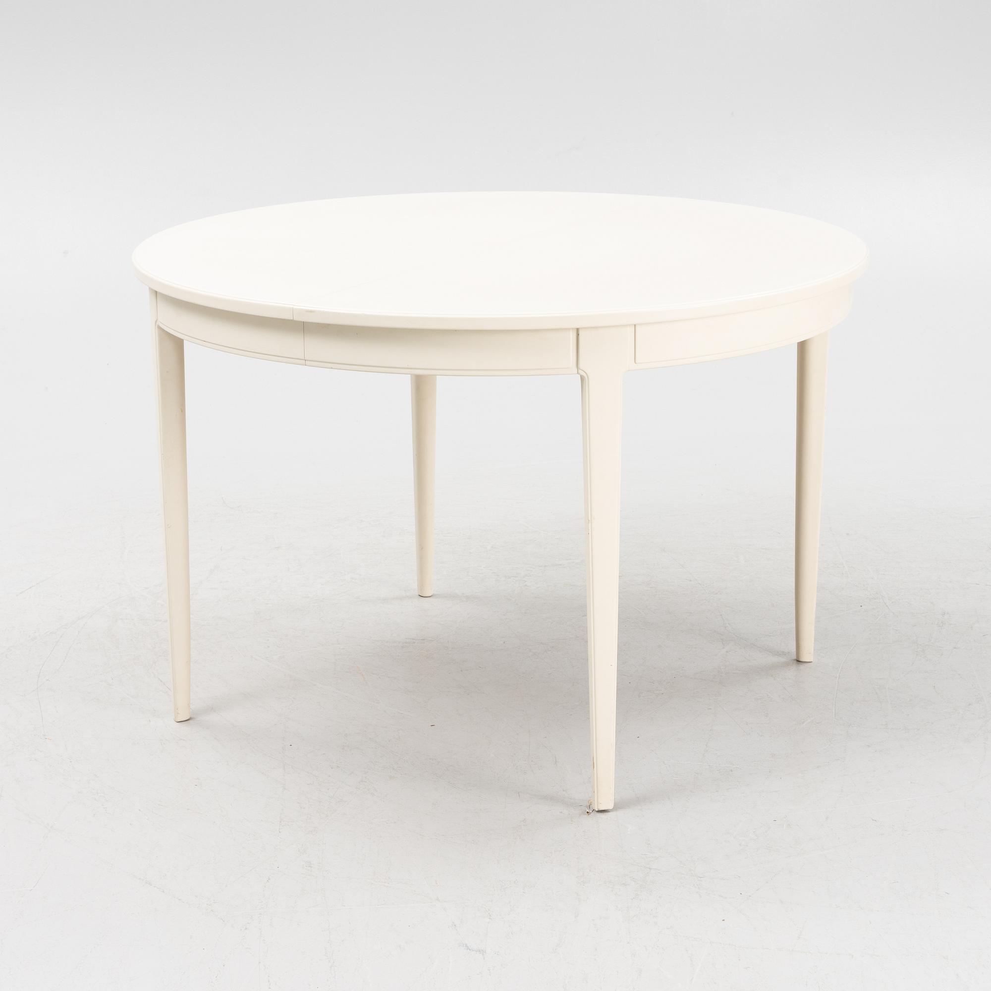 Carl Malmsten, a 'Herrgården' dining table and four 'Ulfåsa' chairs, second half of the 20th Century.