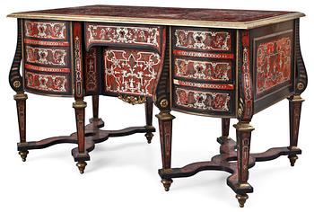 490. A 19th century Baroque-style free-standing writing table in the manner of Charles Boulle.