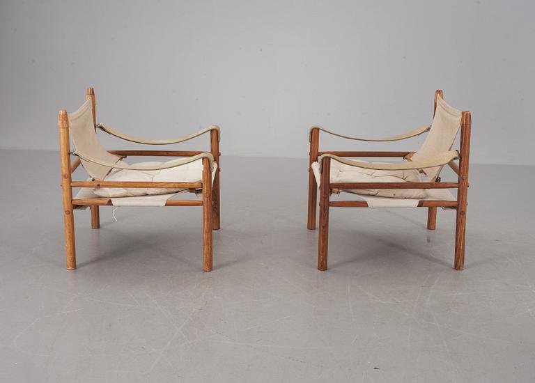 FÅTÖLJER, ett par. "Sirocco", Arne Norell, modellen formgiven 1964. CITES-intyg medföljer.