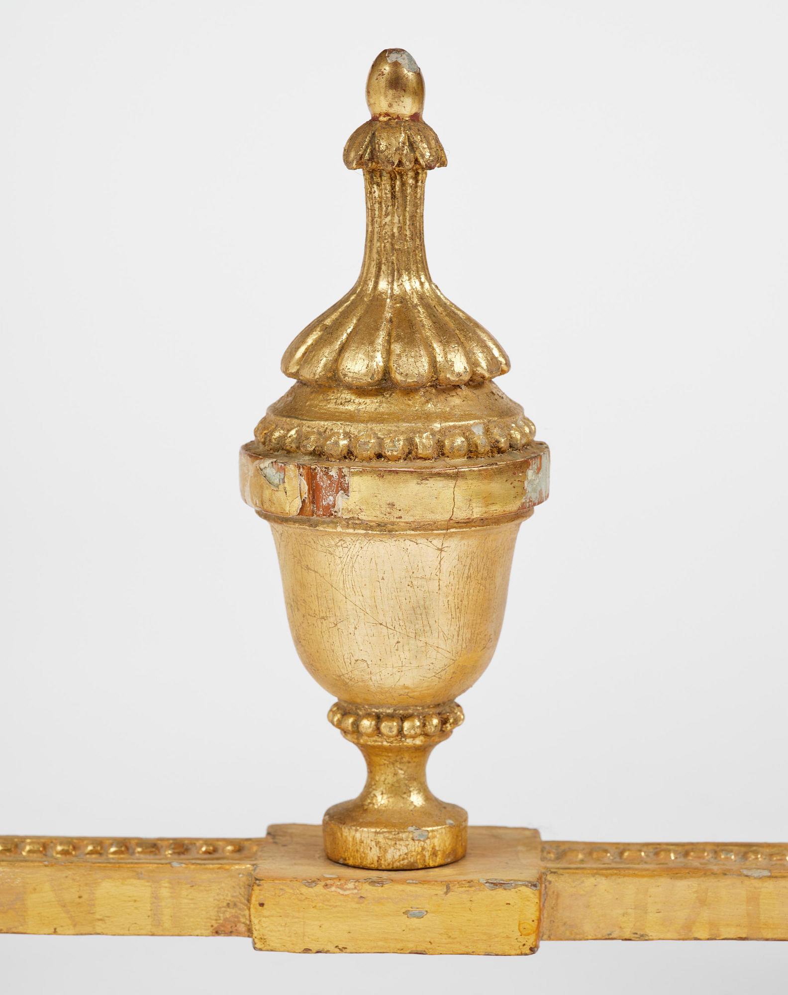 A Gustavian giltwood and Kolmårdsmarble-top console table, Stockholm, late 18th century.